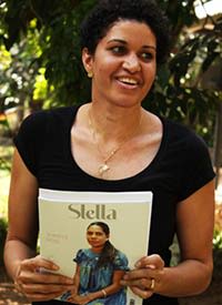 Woman holding Stella magazine