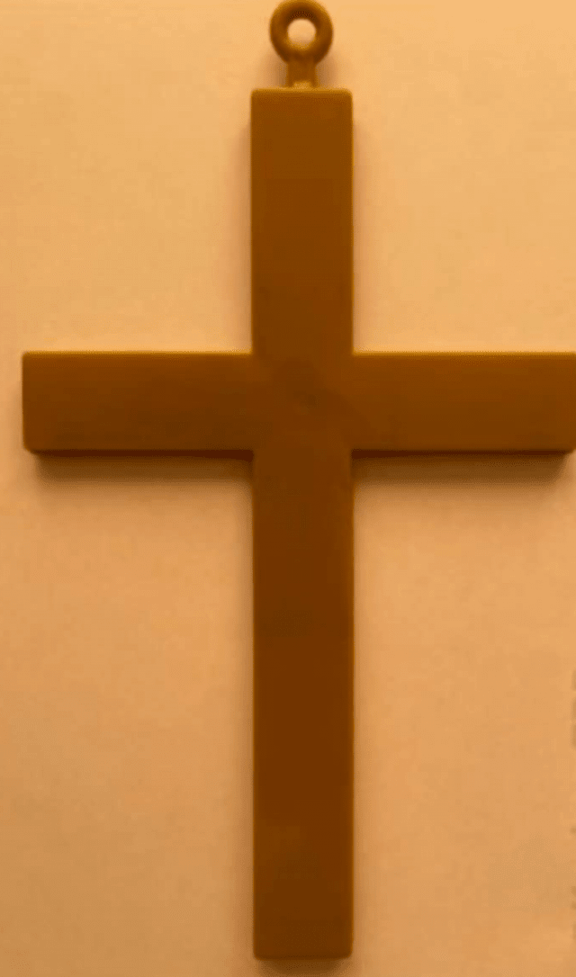 What should a non-believer do with a cross when it is no longer needed?