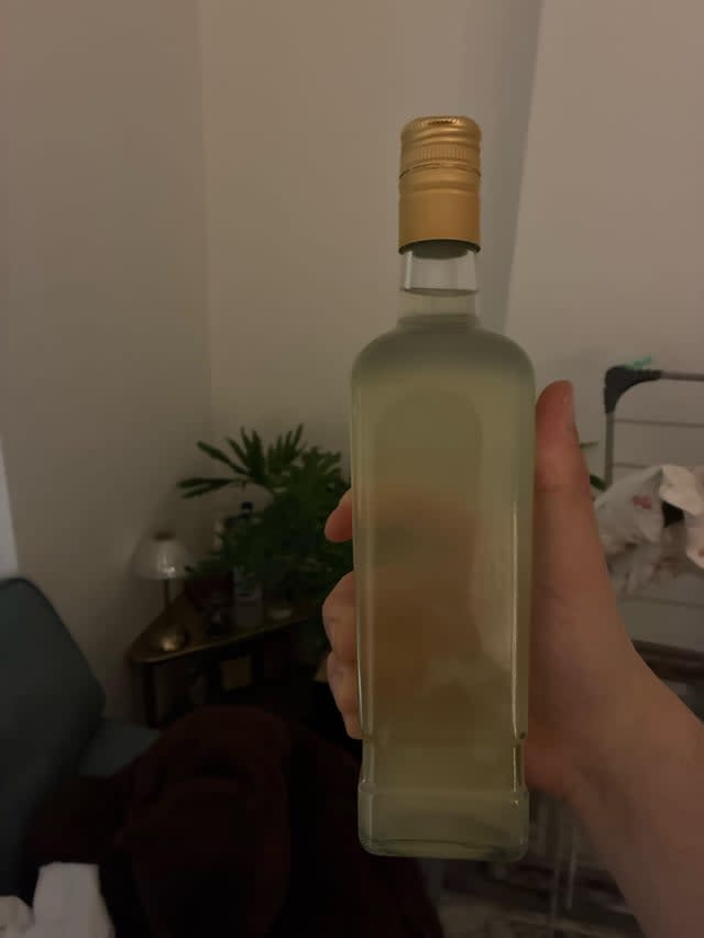 Is giving an unbranded possibly homemade alcohol a normal custom in Poland?
