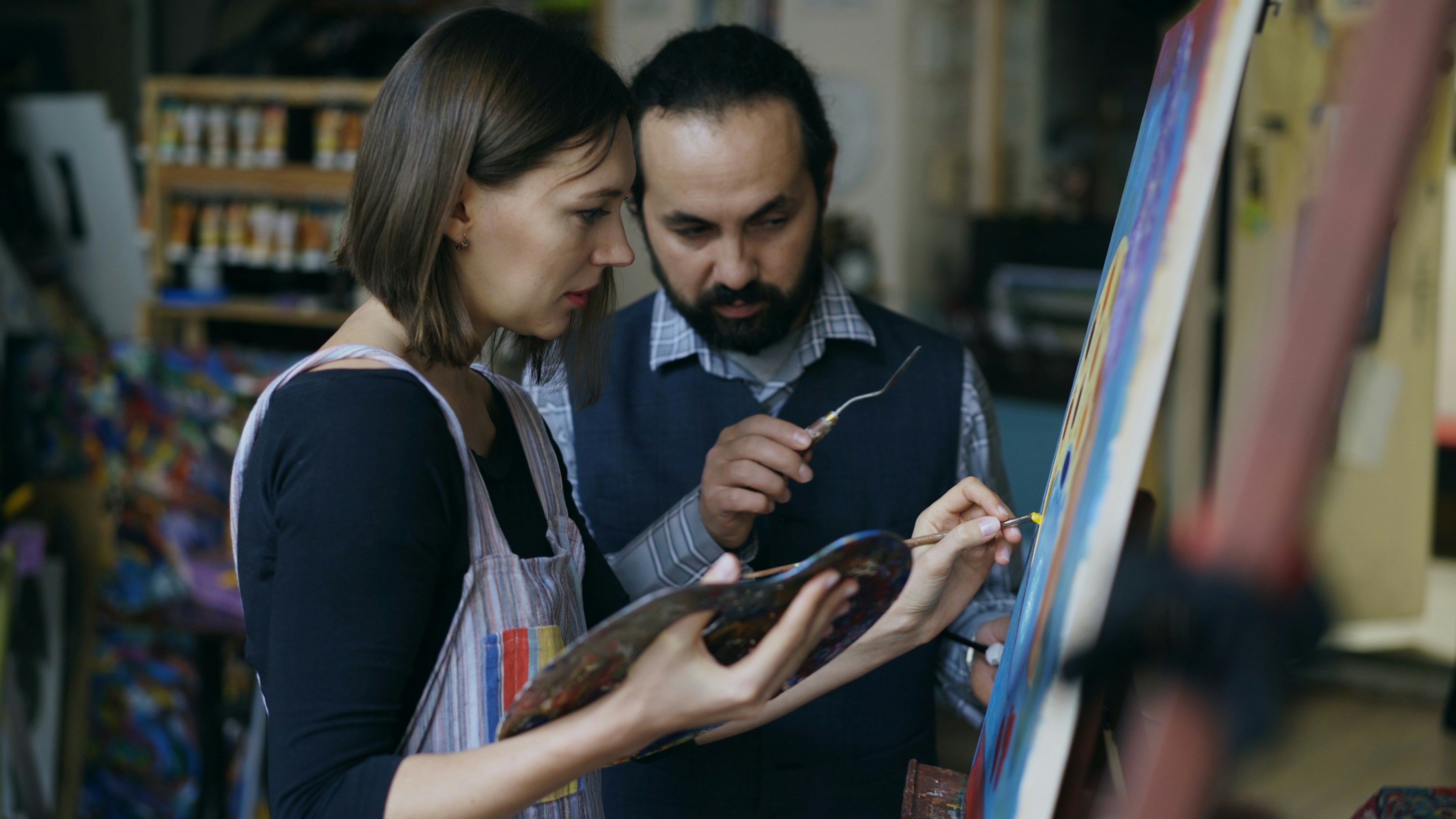 Artists sharing work in online art contest