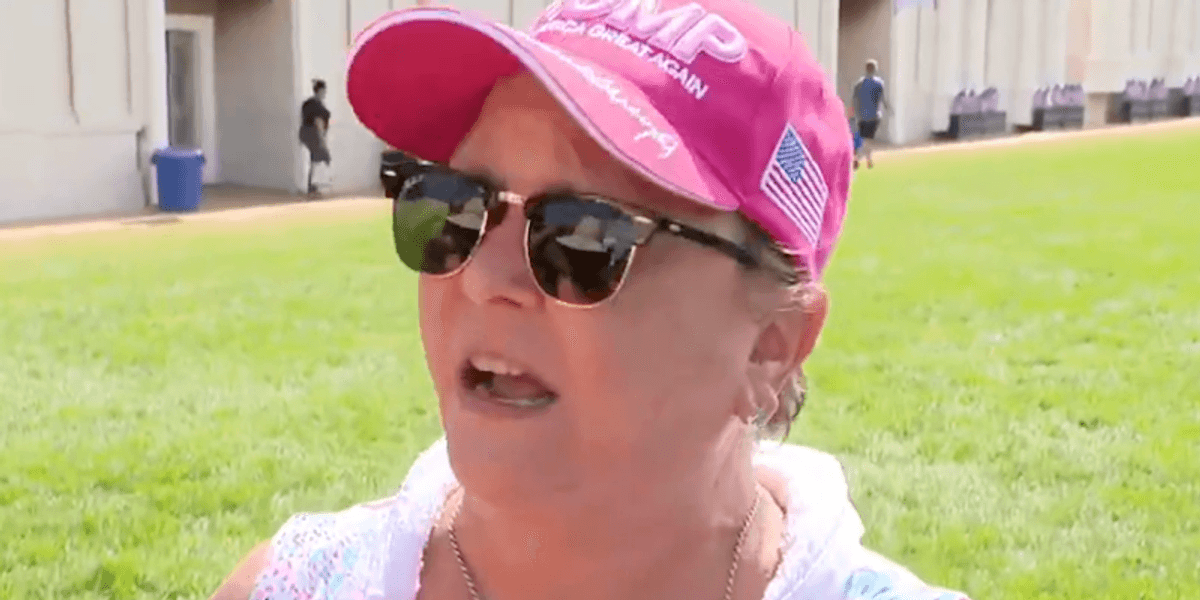 Attendee at political state fair uses baptismal pool for relief during extreme heatwave