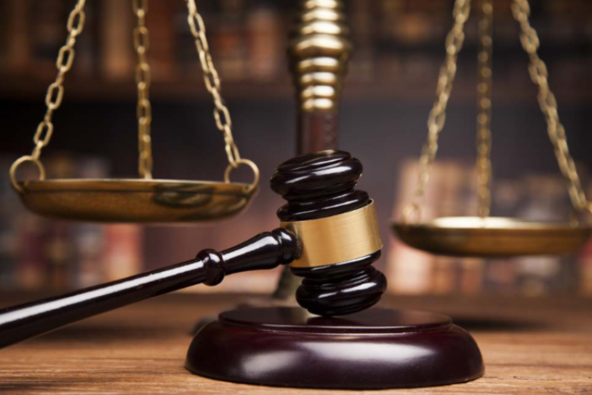 Legal Officer Challenges Dismissal Over Absenteeism Case
