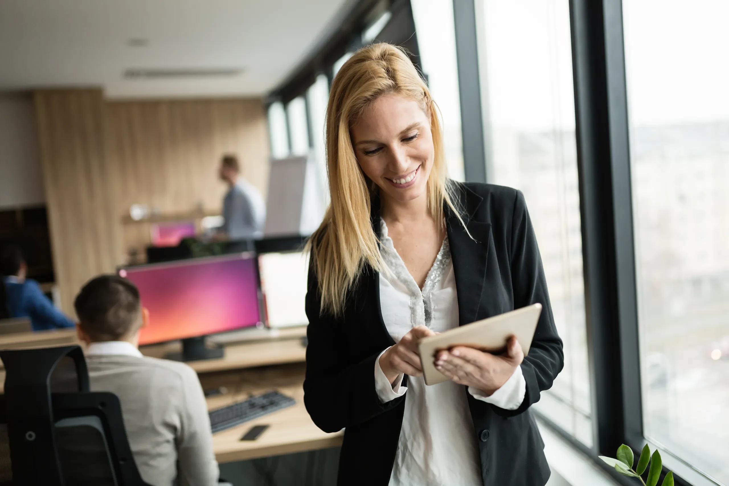 women working on tablet