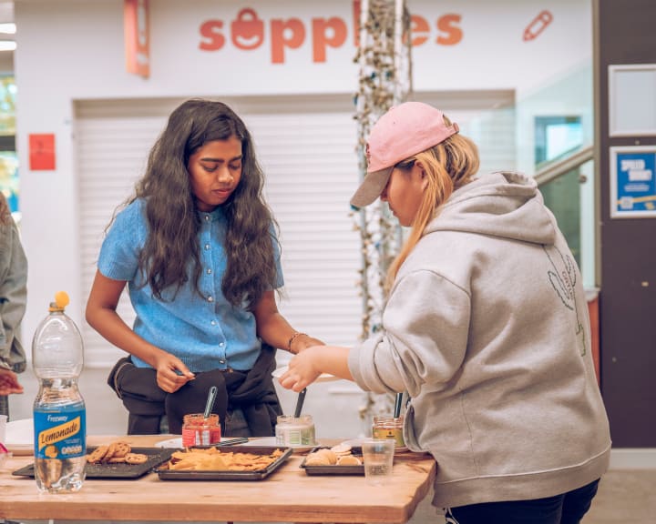 Students at a craft table