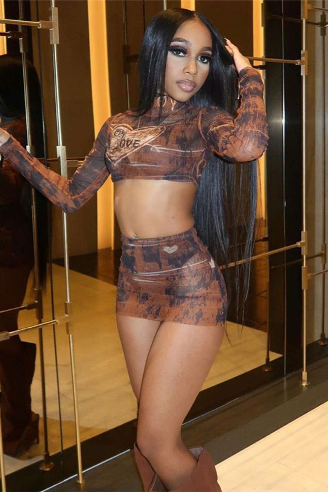 Long-sleeved Mesh Top Sexy High Waist Hip-covering Short Skirt Suit