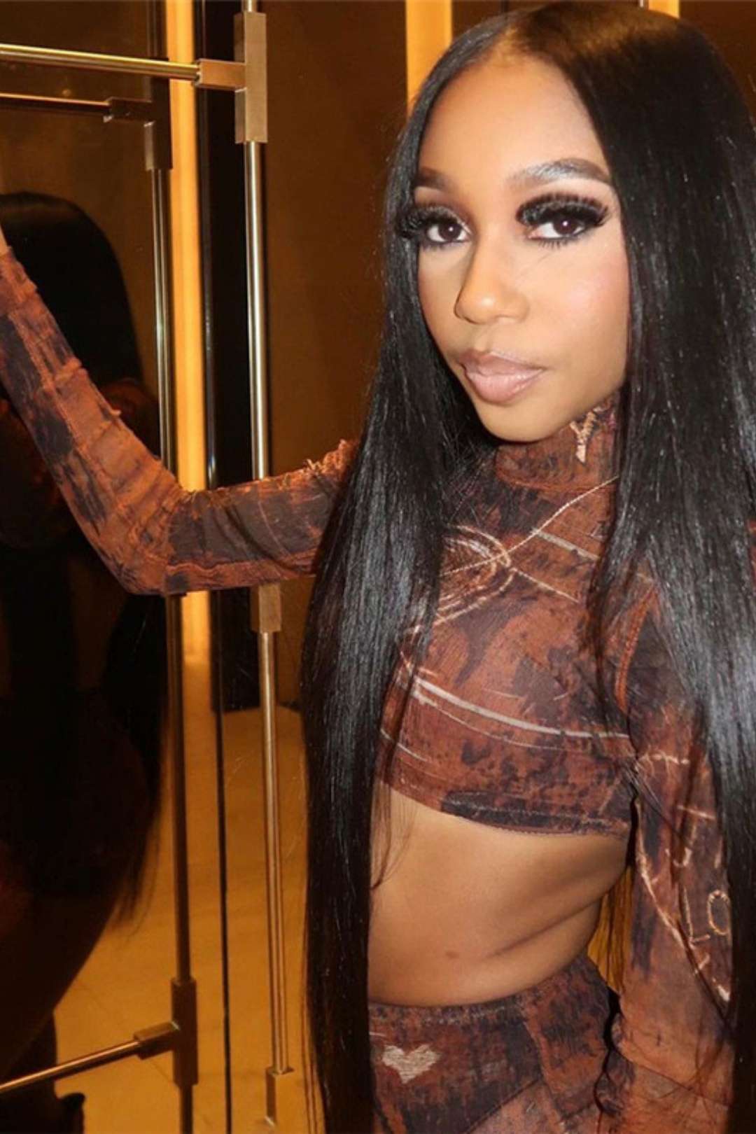 Long-sleeved Mesh Top Sexy High Waist Hip-covering Short Skirt Suit