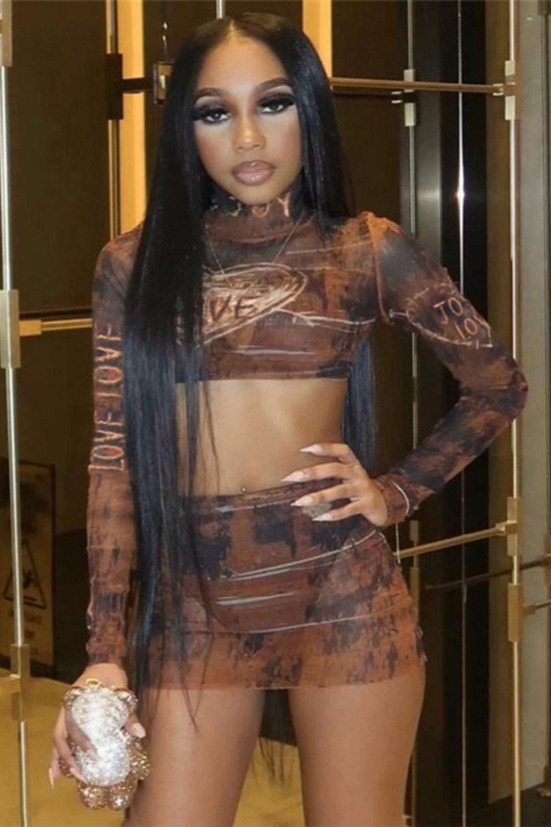 Long-sleeved Mesh Top Sexy High Waist Hip-covering Short Skirt Suit