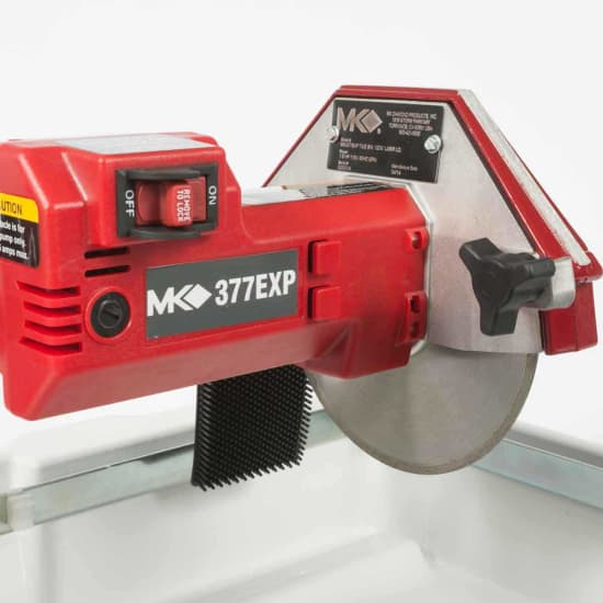 160028 MK-377EXP Tile Saw Single piece zinc-plated steel frame for rigidity, strength and durability, Hinged blade guard for easy blade changes