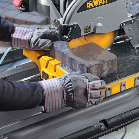 Dewalt Tile Saw cutting pavers