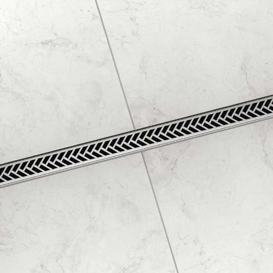 The KERDI-LINE-VARIO Linear Drain in bathroom white tile