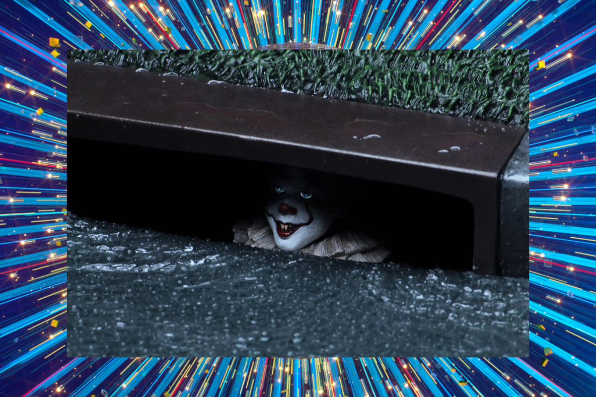 Evil clown stares from within a drain