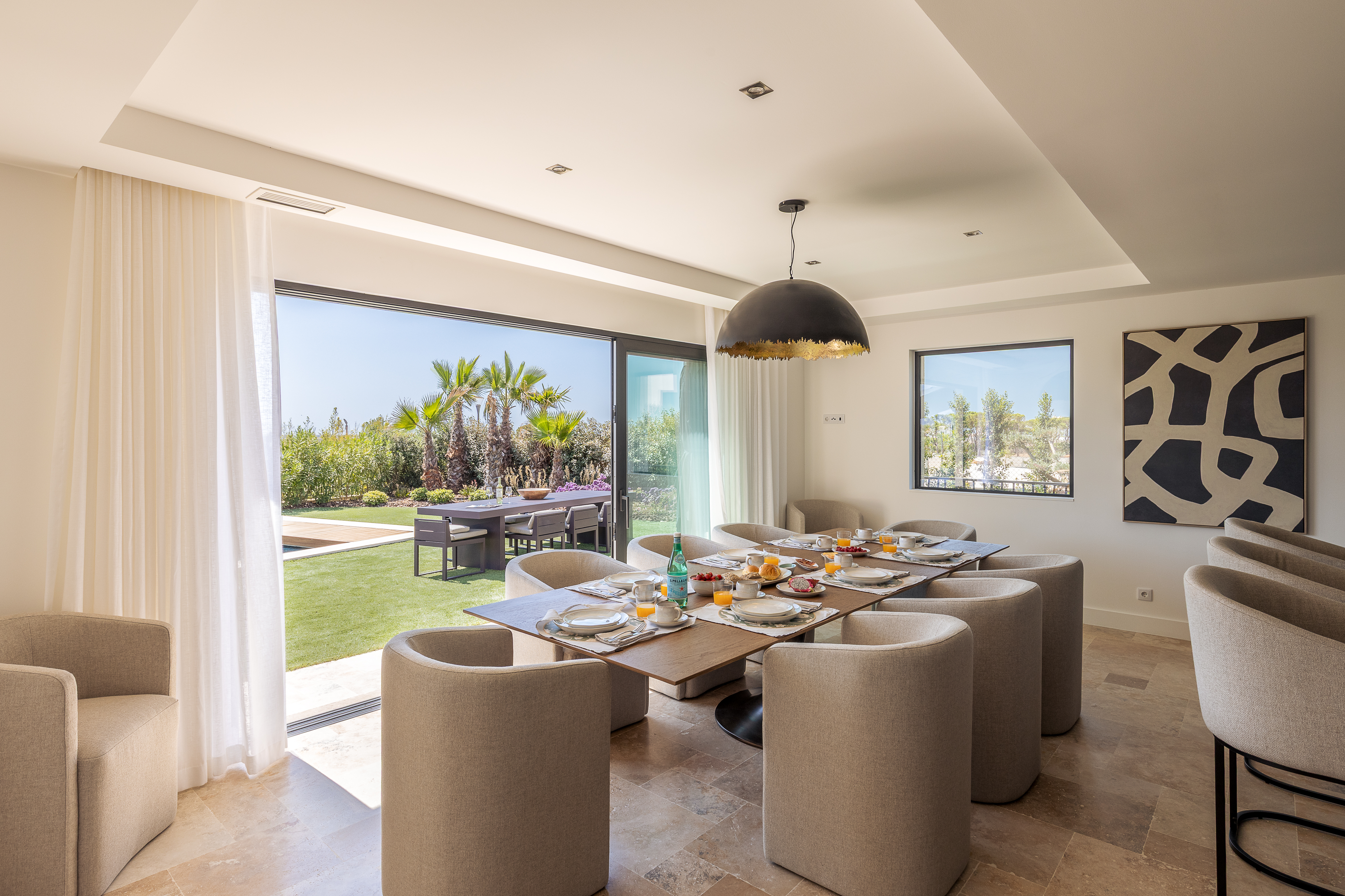 Suite 1 — King bedroom with black marble en-suite and garden terrace