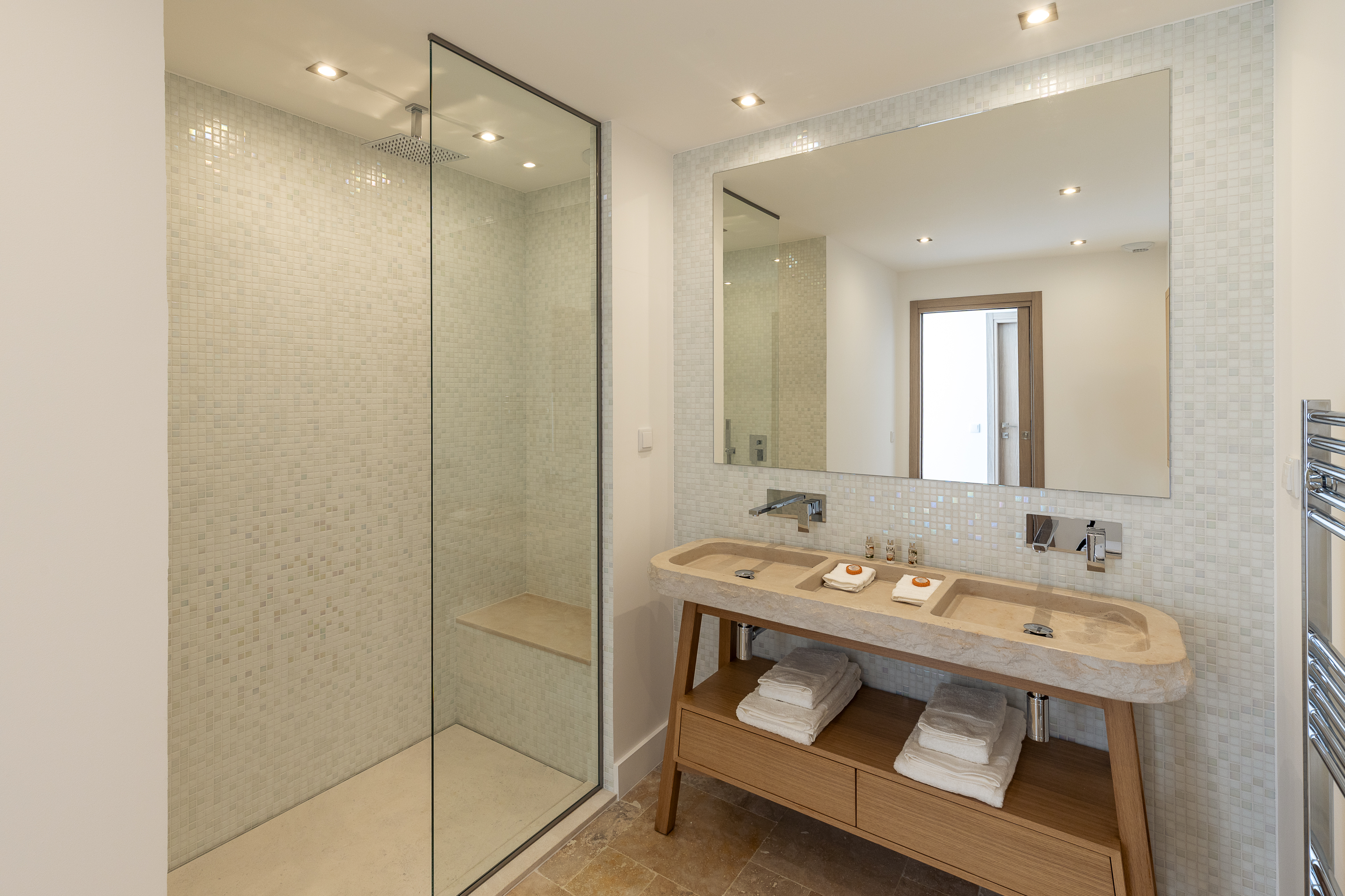 En-suite double vanity with rain shower