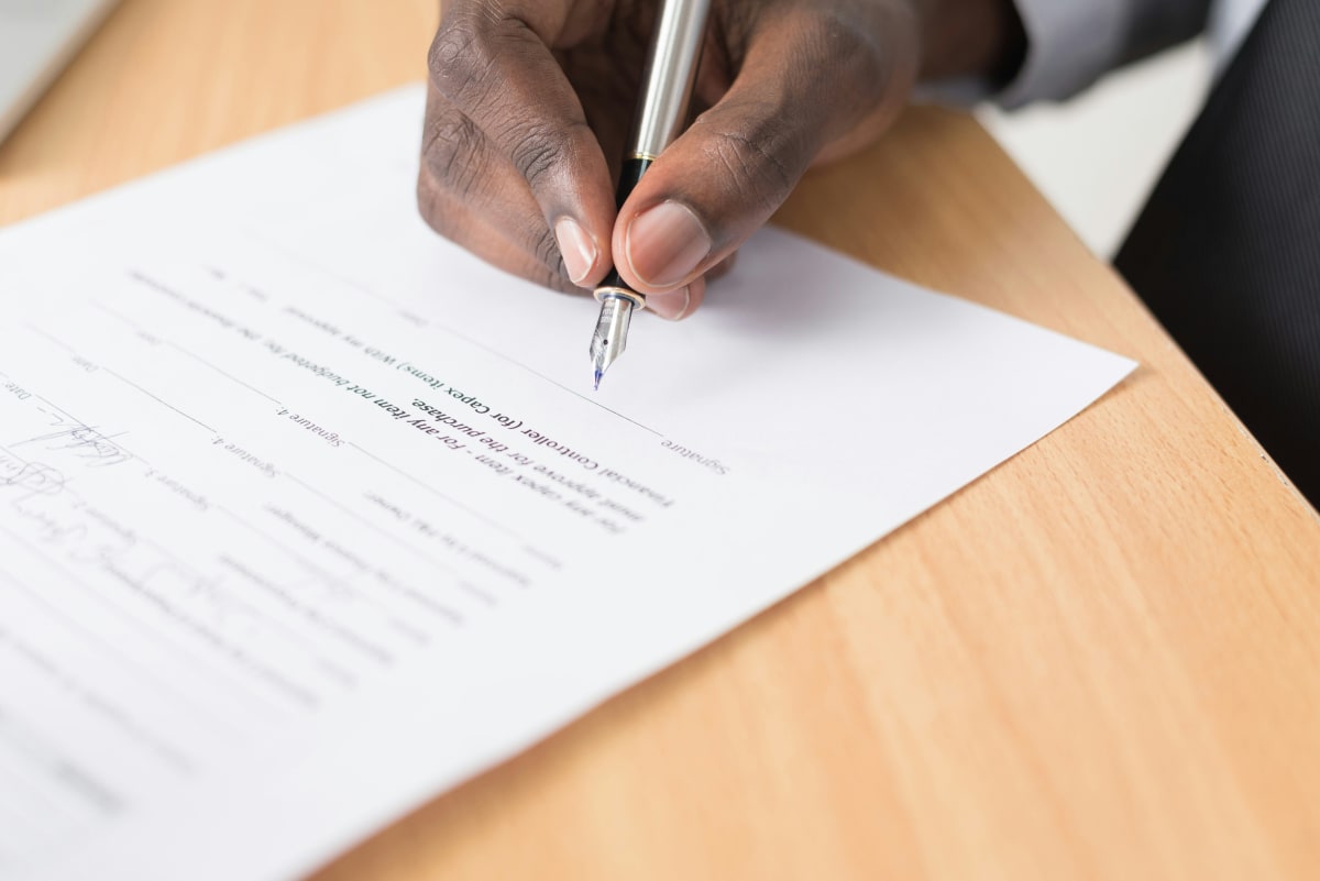 Signing a lease agreement in Zambia