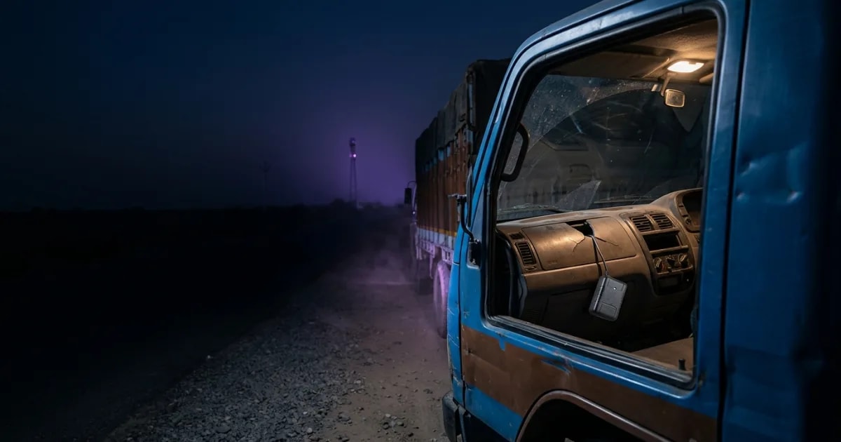 A certified AIS-140 GPS device being installed in an Indian truck with wiring visible