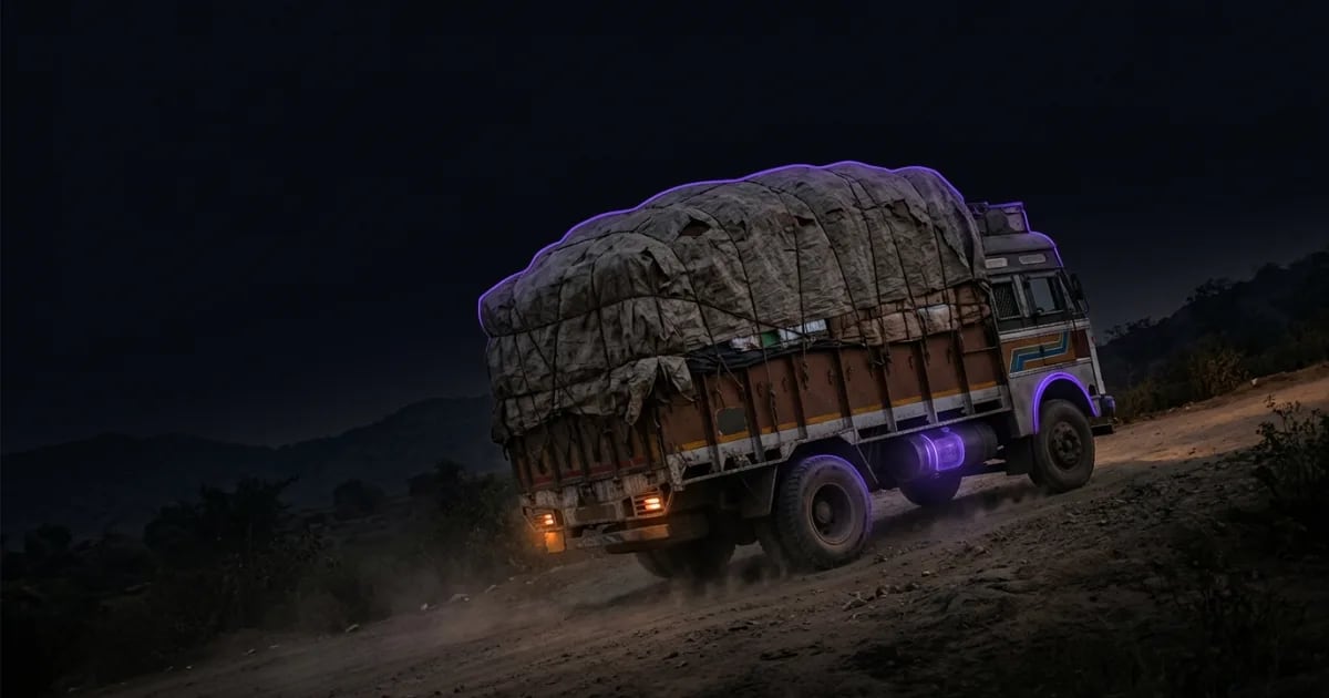 A transparent price tag on a truck, illustrating the clear fleet management software price per vehicle in India.