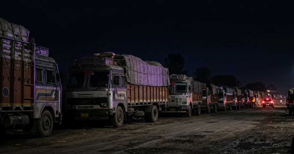 A truck parked at a depot with the engine off, illustrating the concept of preventing unnecessary idling