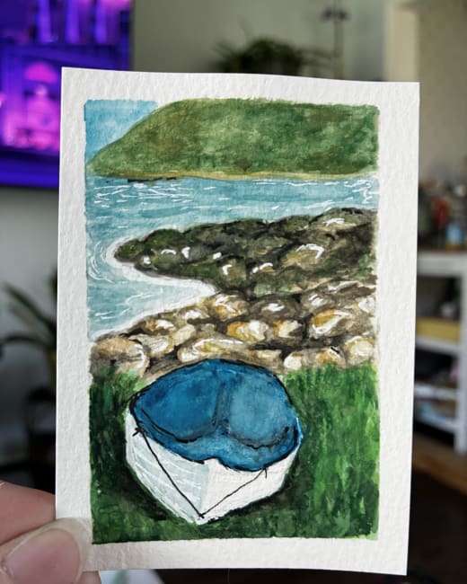 Rowboat by a mountain lake