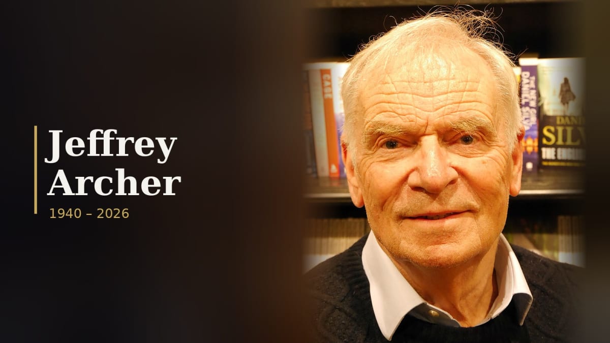Jeffrey Archer, white-haired British novelist, smiling in a dark sweater in front of bookshop shelves at Hatchards, London, 2024