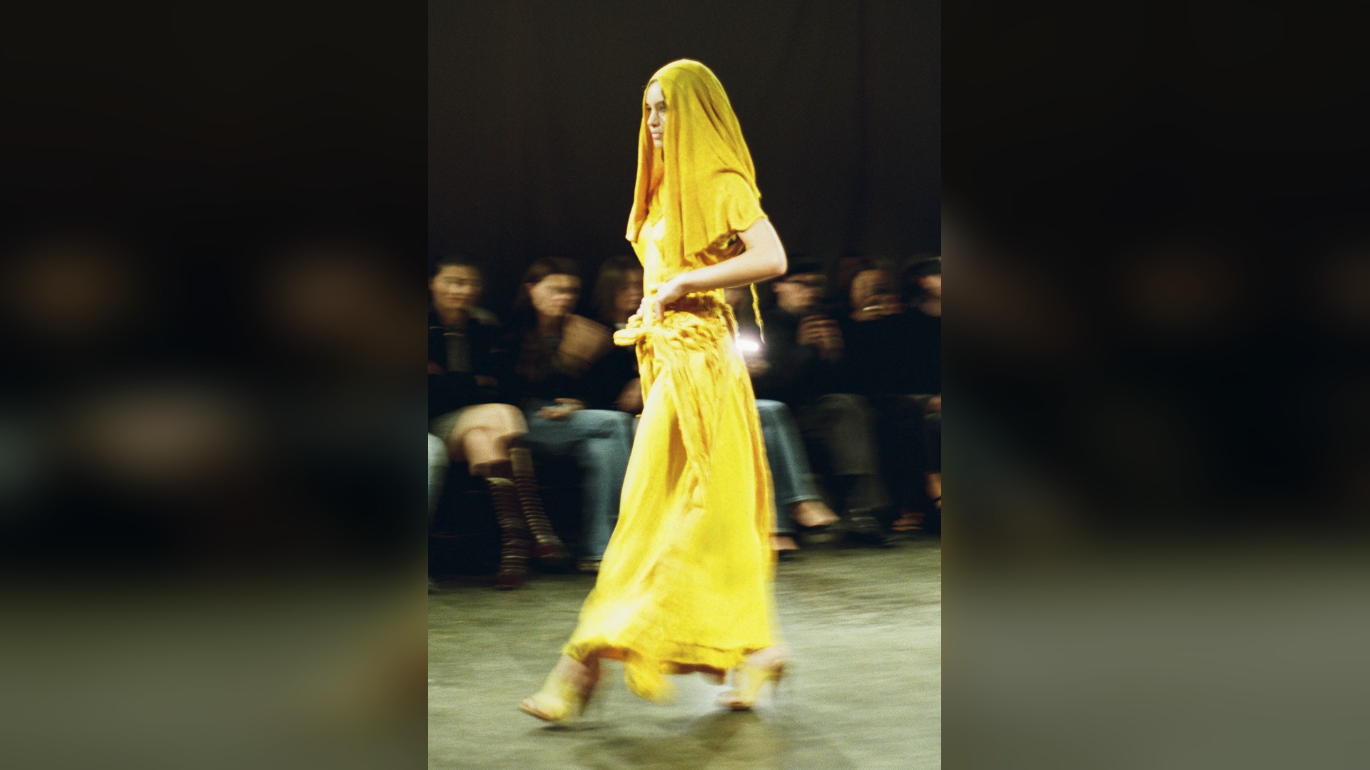 Paolo Carzana SS27 London Fashion Week runway, yellow shroud look