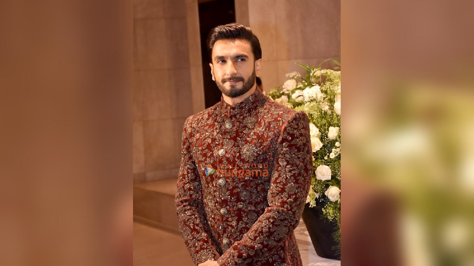Actor Ranveer Singh in a maroon embroidered sherwani