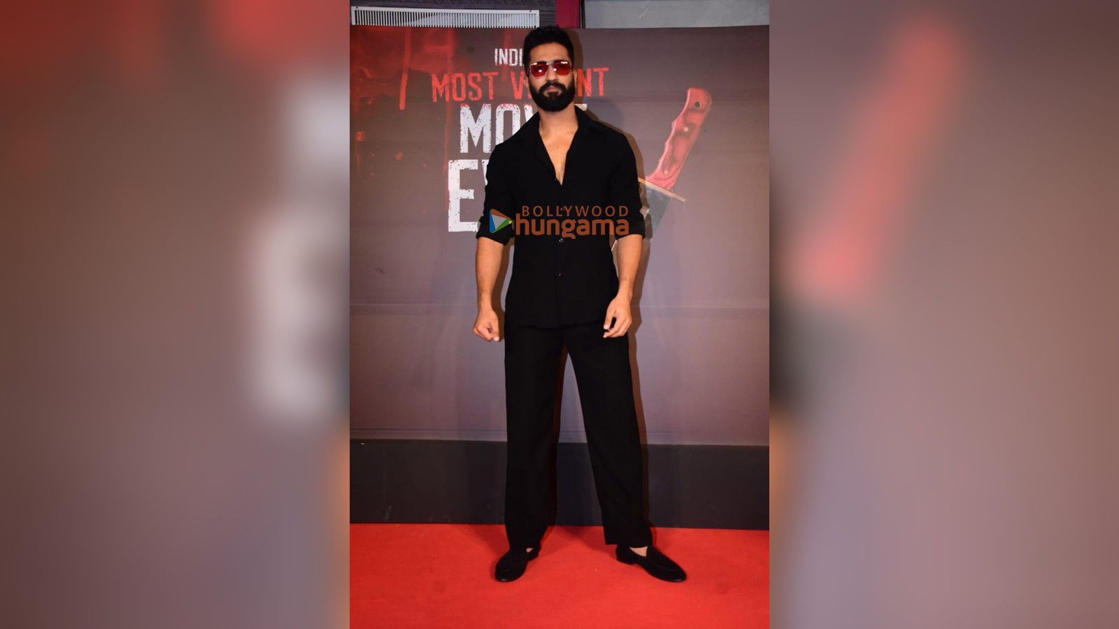 Actor Vicky Kaushal in black at a film premiere