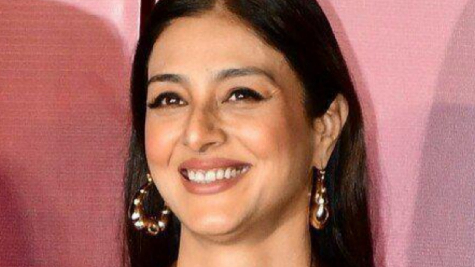Actor Tabu smiling at an event in 2024
