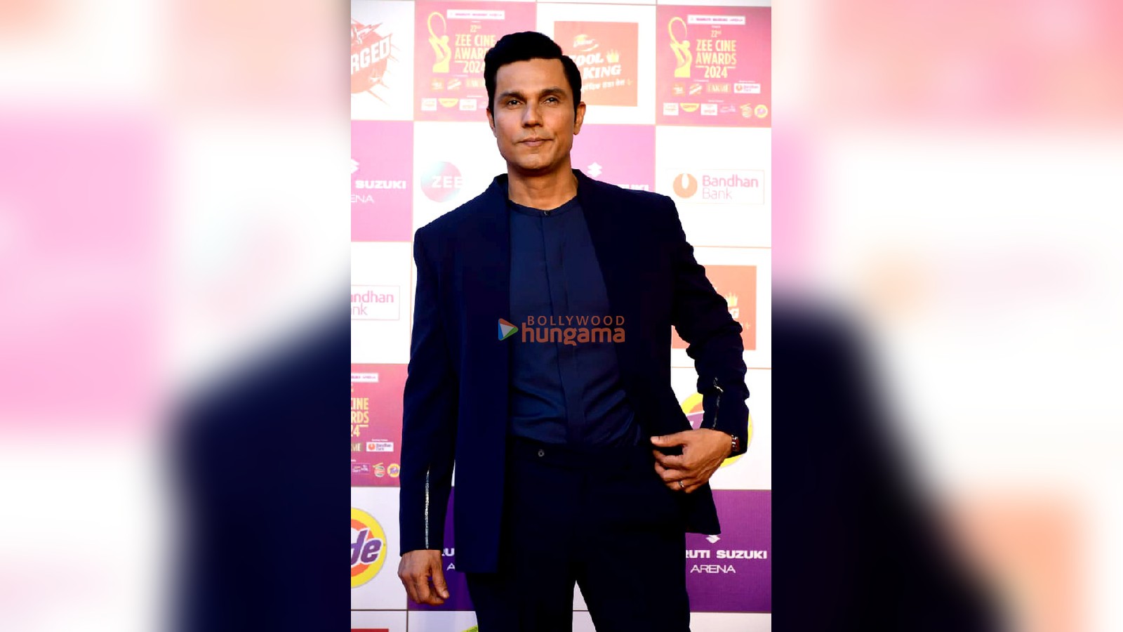 Actor Randeep Hooda in a navy blazer at an awards event
