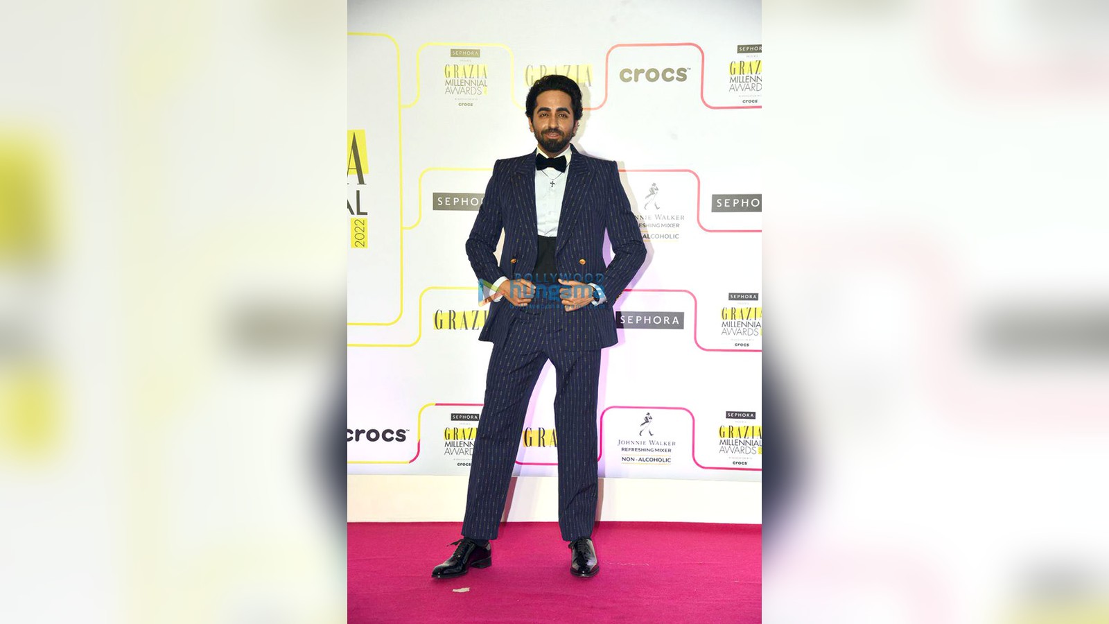Actor Ayushmann Khurrana in a dark suit at an awards event