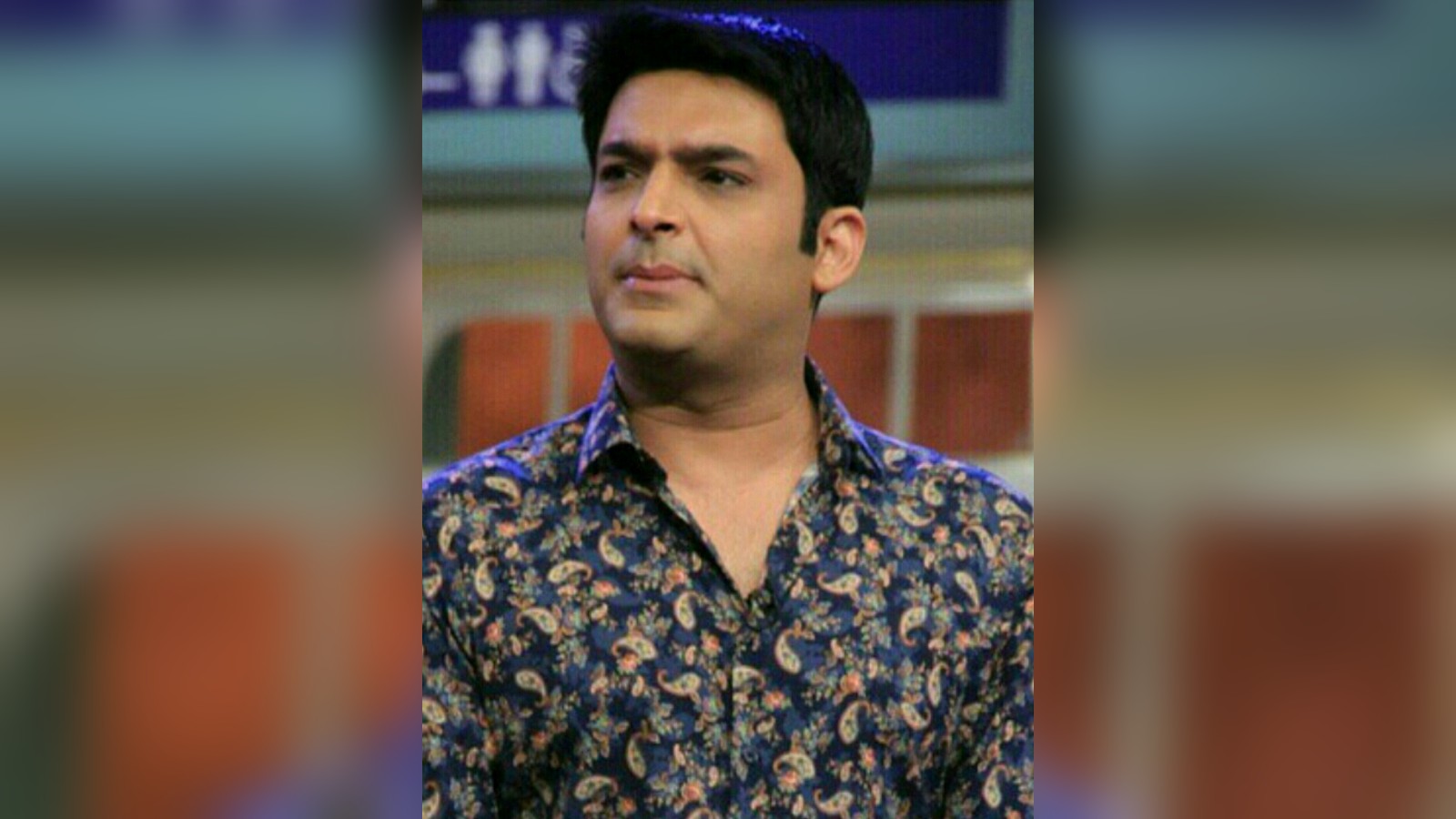 Comedian Kapil Sharma in a patterned dark shirt