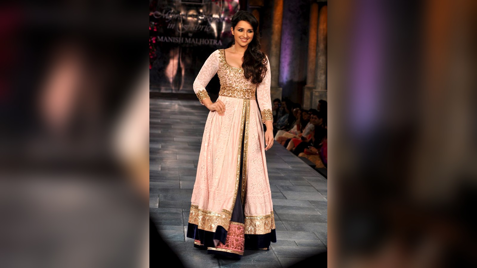 Actress Parineeti Chopra posing at an event