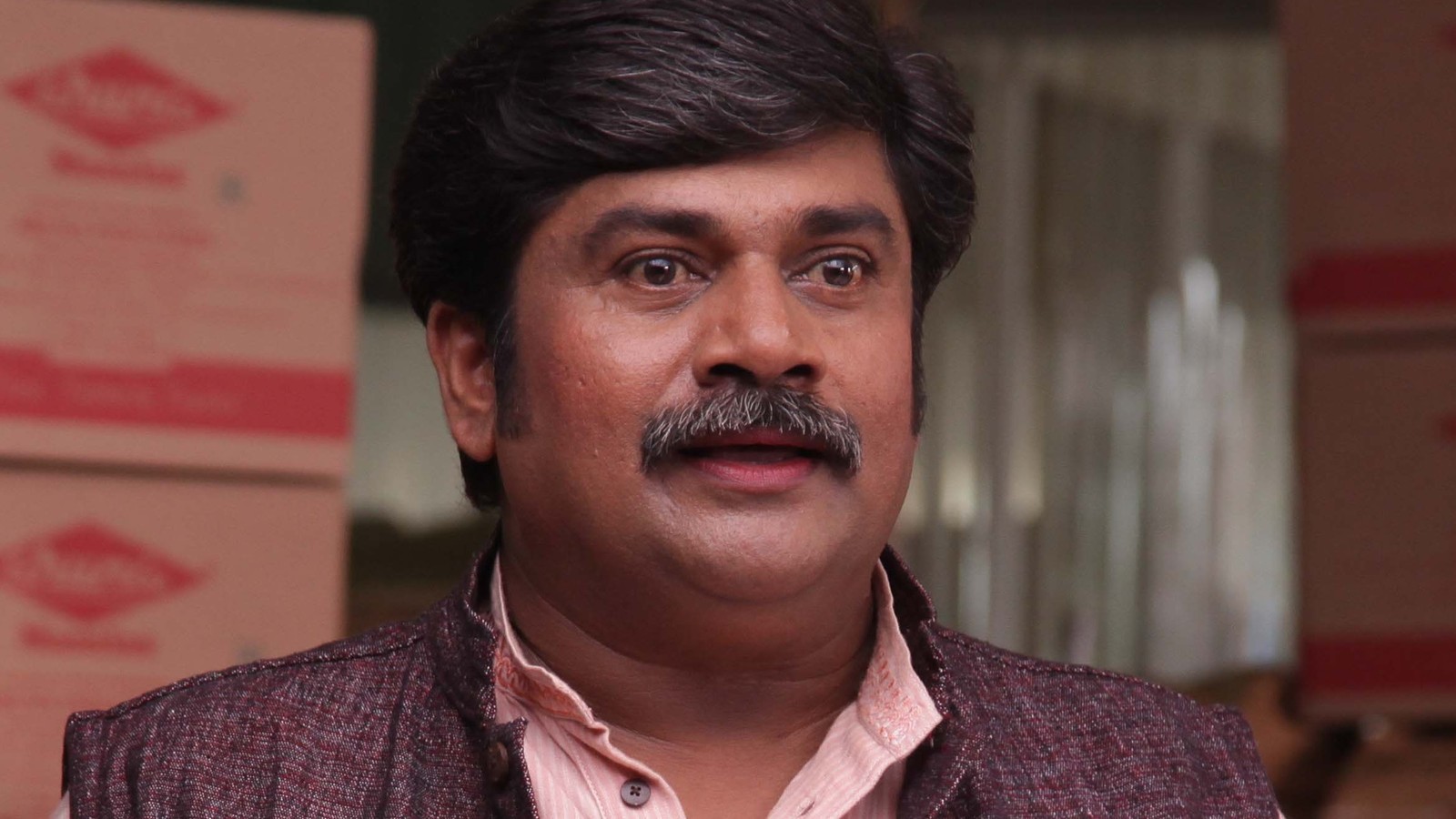 Actor Rangayana Raghu on a film set