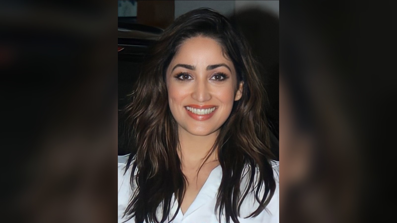 Actress Yami Gautam smiling at a screening event