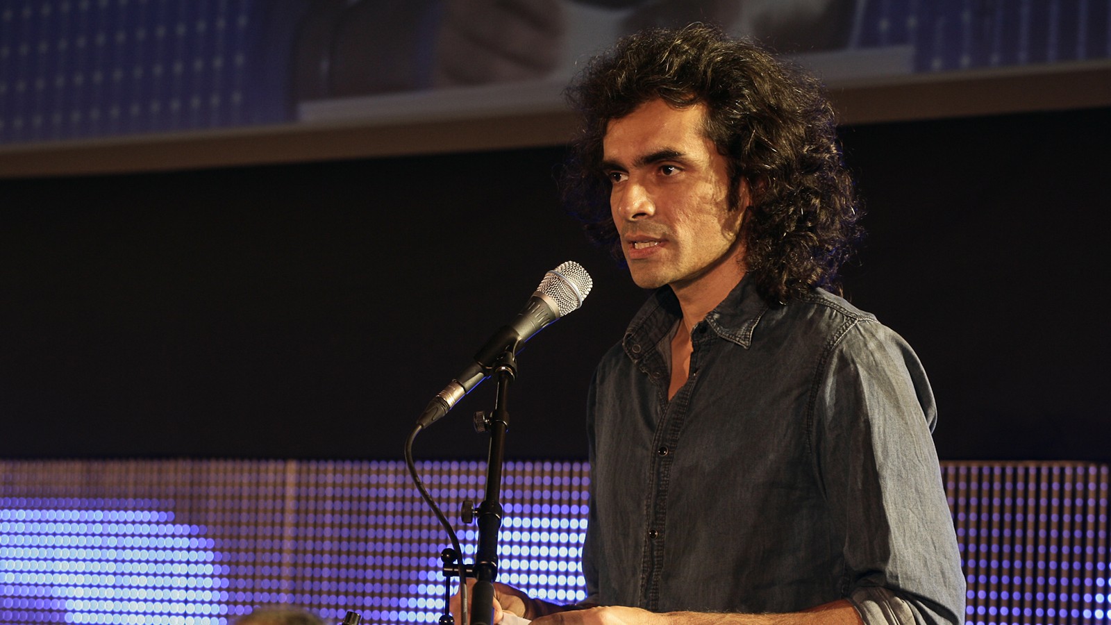 Director Imtiaz Ali speaking at a business meeting in Antwerp in 2012