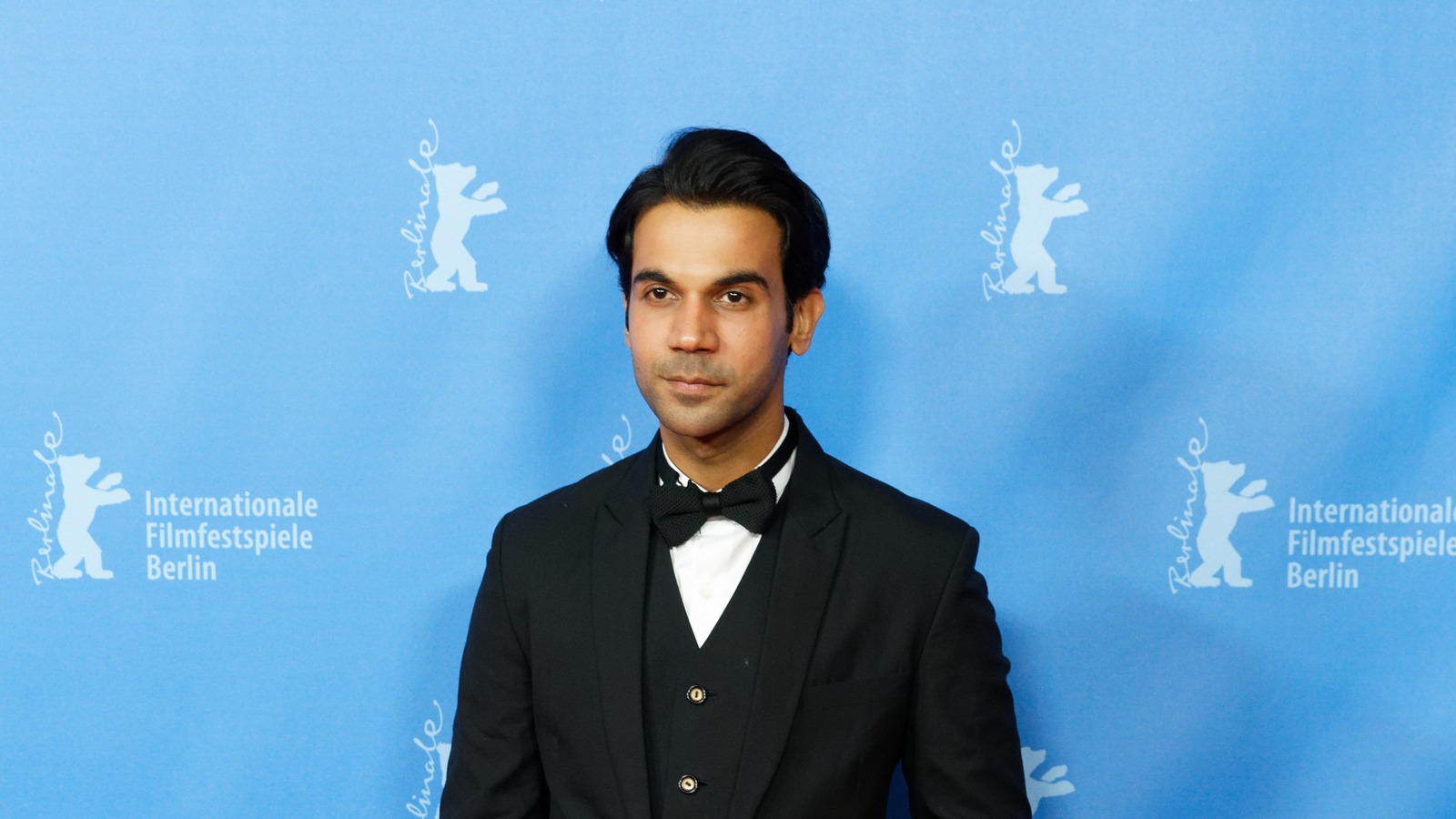 Actor Rajkummar Rao in a black tuxedo and bow tie at the Berlinale premiere of Newton in 2017