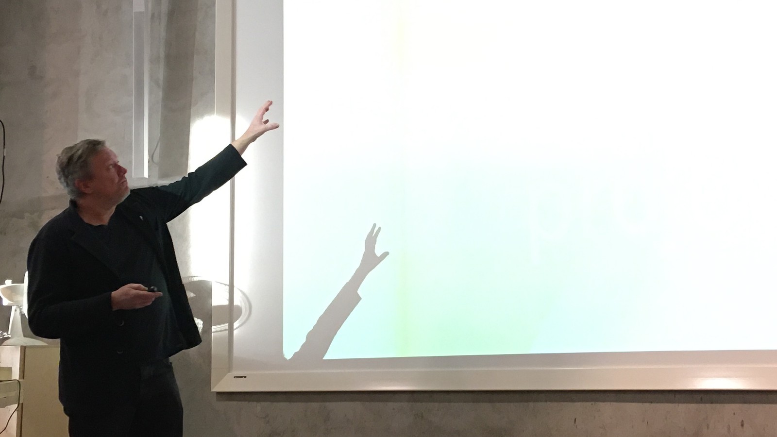 Snøhetta co-founder Kjetil Thorsen pointing at a projection screen during a workshop in Oslo, January 2020