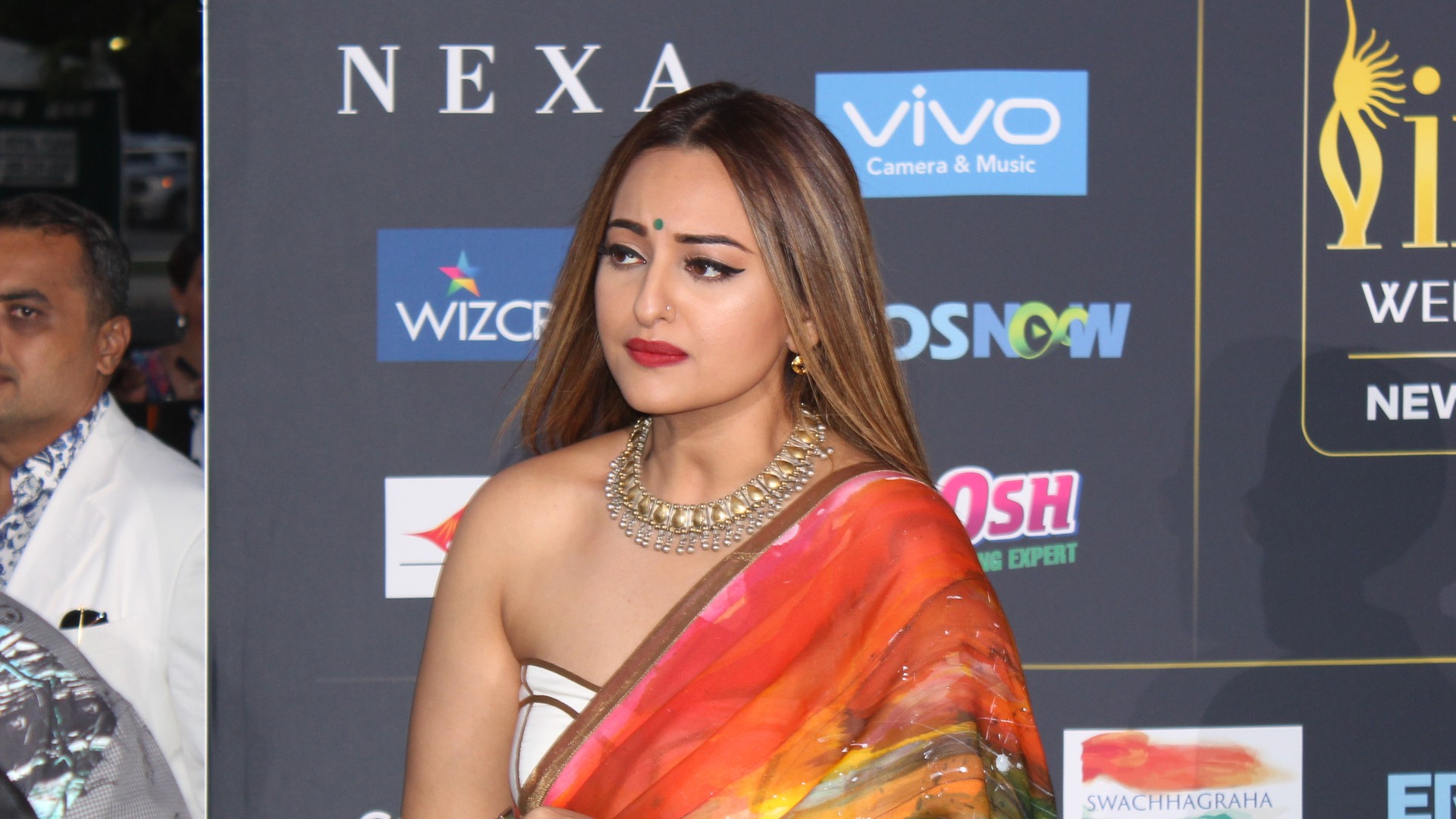 Sonakshi Sinha in a multicoloured sari and gold necklace on the IIFA 2017 green carpet at MetLife Stadium, New Jersey