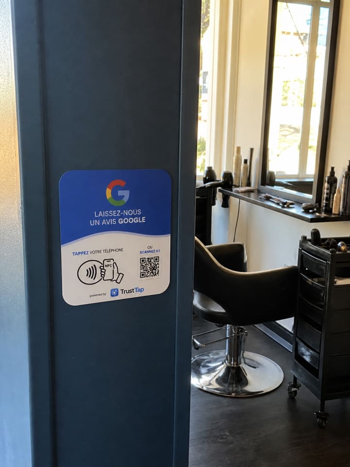 TrustTap plate on a visible wall