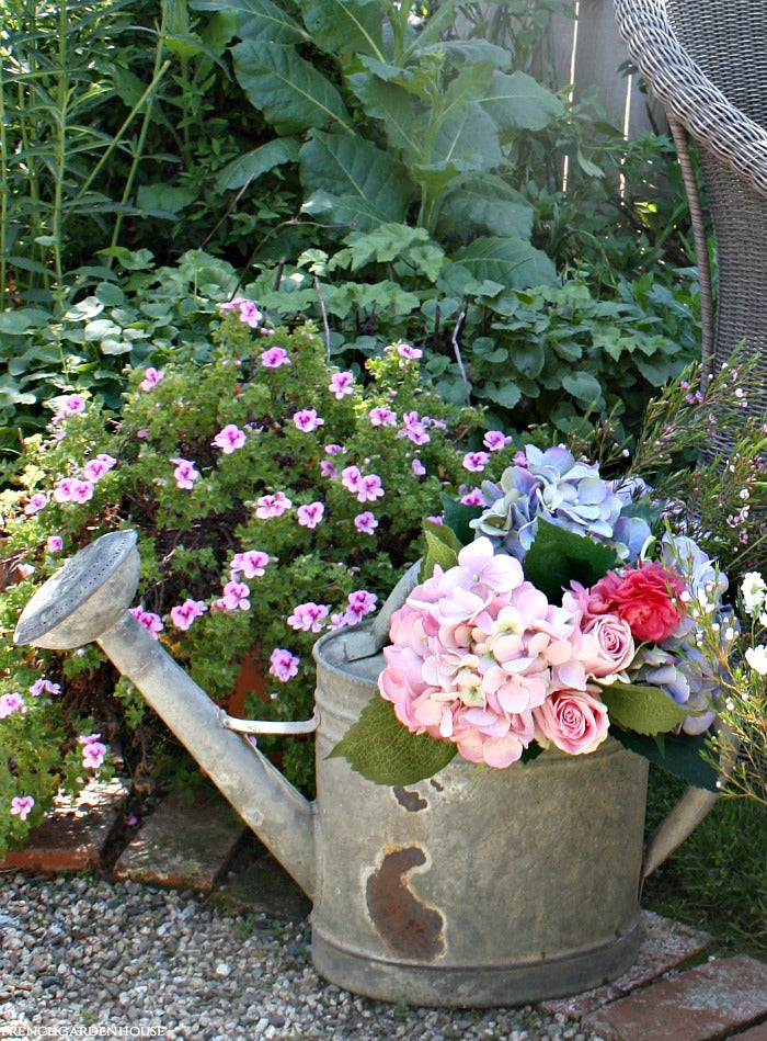 vintage watering can floral