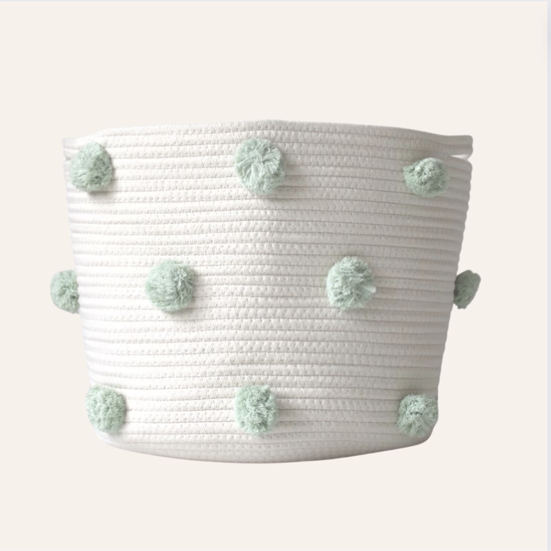 rope basket with pom poms