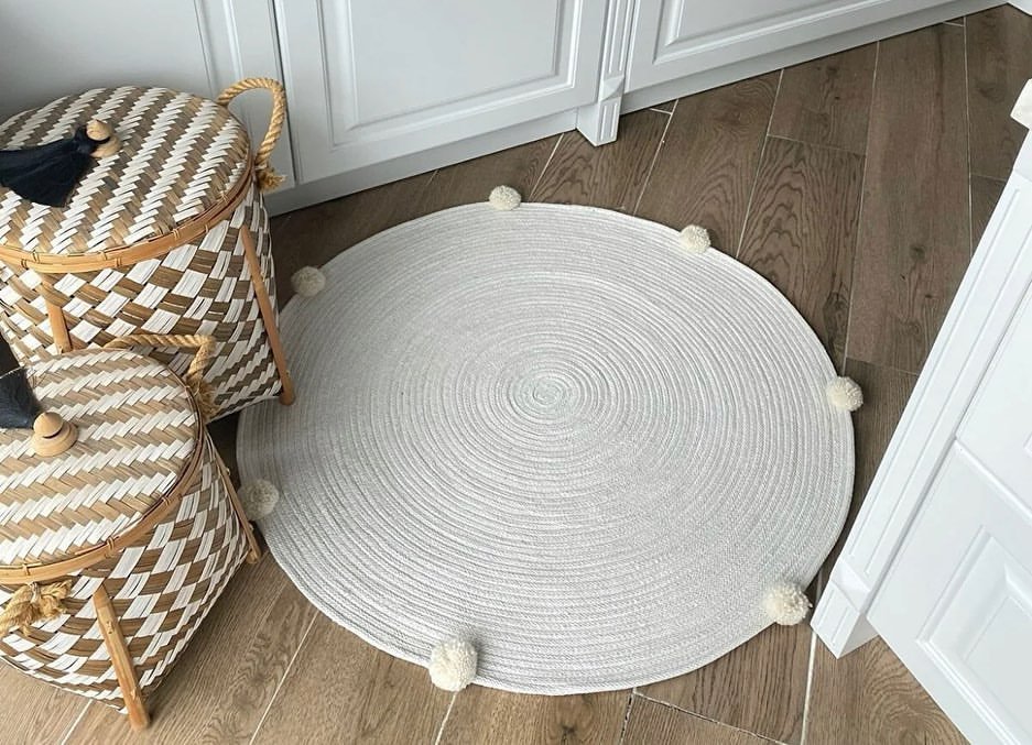 minimalist pom pom rug