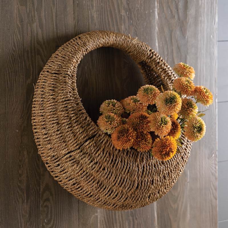 entryway open shelves with woven seagrass baskets