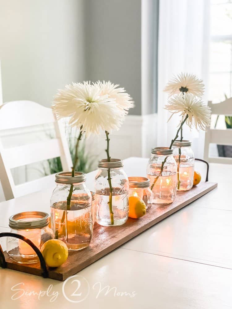 mason jars with handles on outdoor dining table