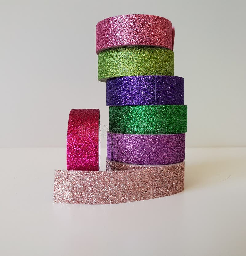 glass vase wrapped in colorful washi tape stripes