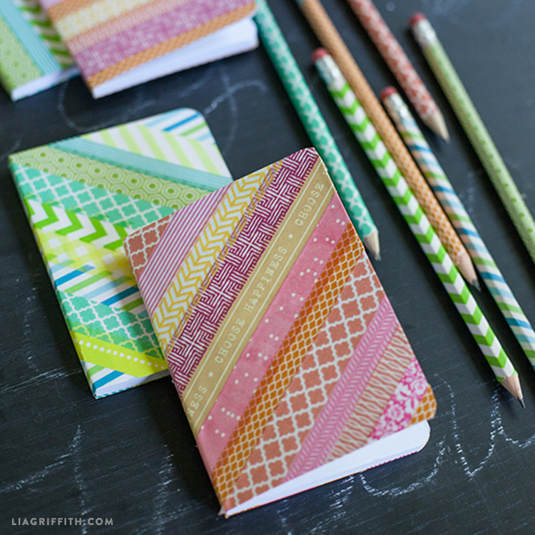 decorated spiral notebook with washi tape patterns