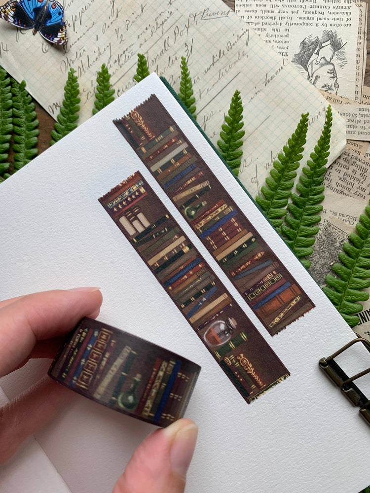bookshelf with washi tape on book spines