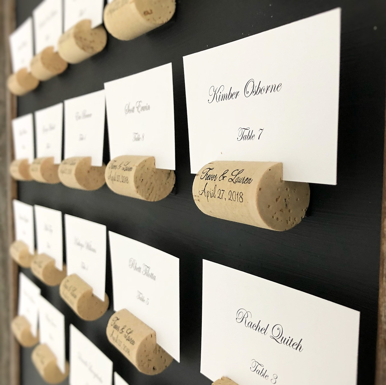 cork place card holders on table
