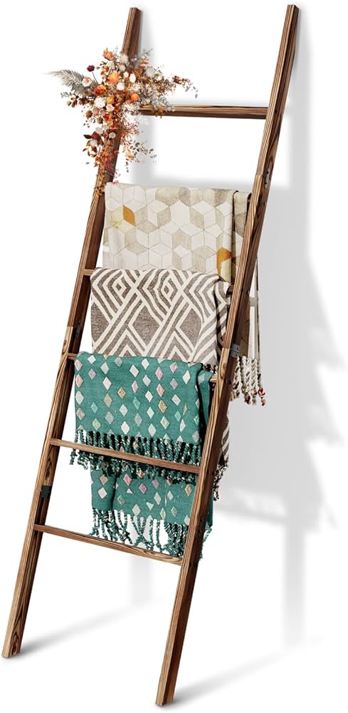 wooden ladder with folded blankets