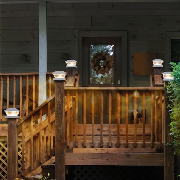 solar deck post lights on wooden railing