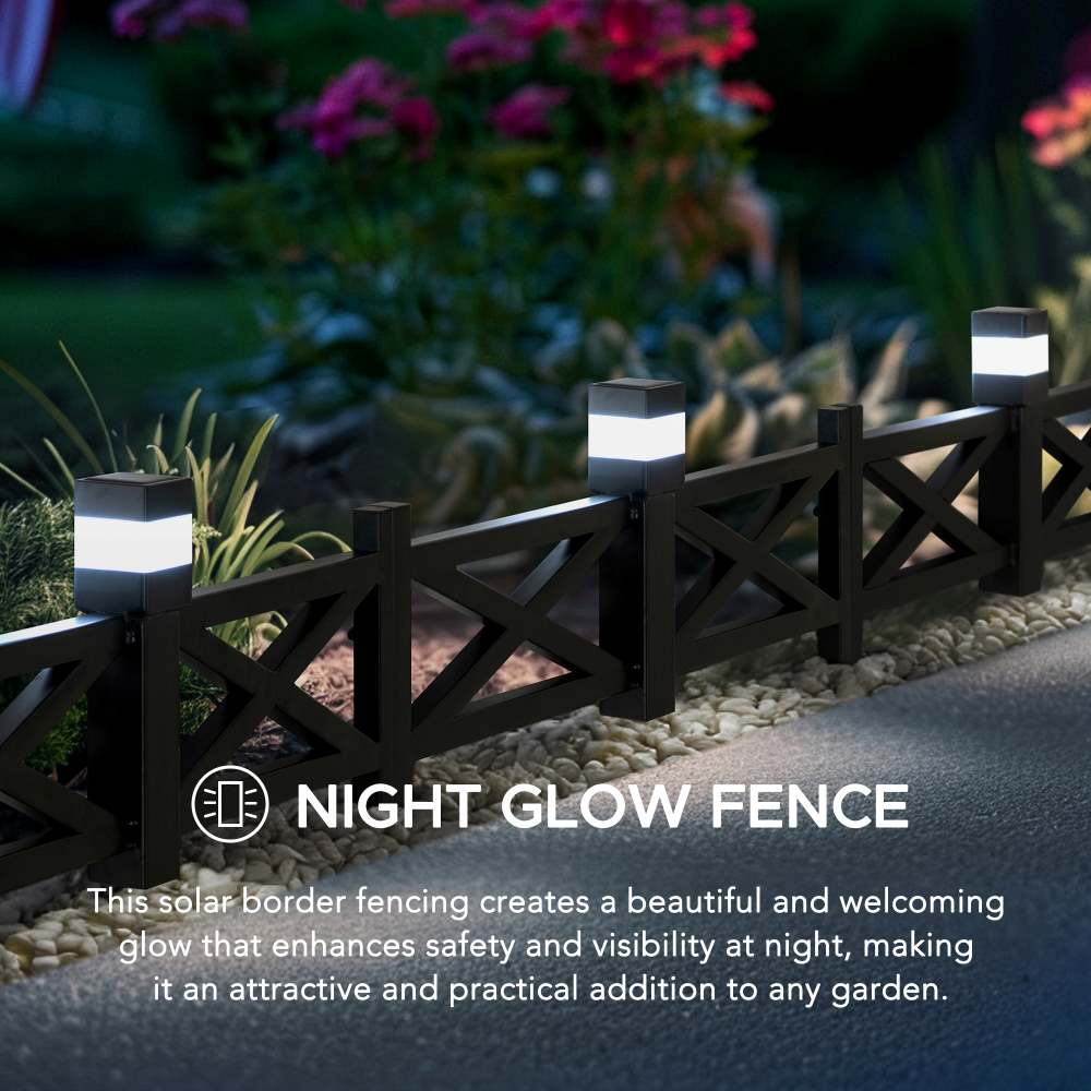solar flower lights glowing in garden border